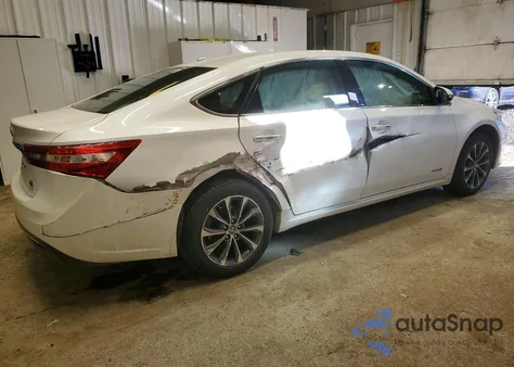2016 Toyota Avalon Hybrid z USA, uszkodzony, nr VIN 4T1BD1EB2GU053245